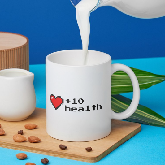 +10 Health Gamer Mug | White Pixel Art Coffee Cup for Gamers